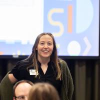 person standing in front of screen